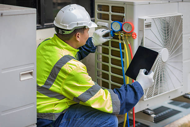 Professional Ac Installation technician working in Helenville, WI